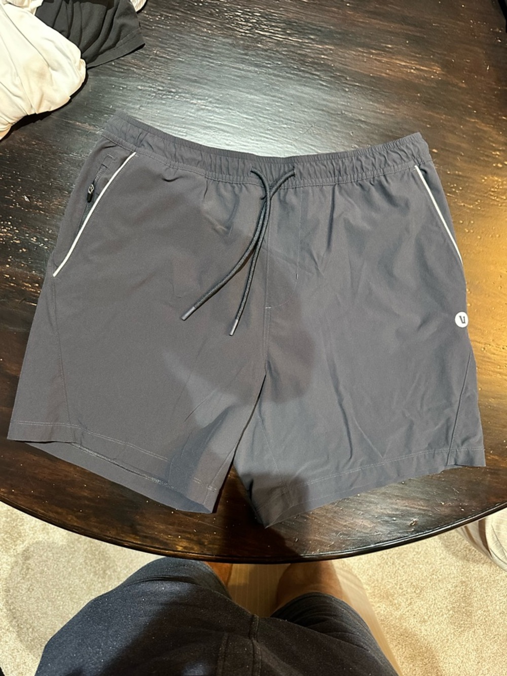 Vuori Black Men's Athletic Shorts with Reflective Piping
